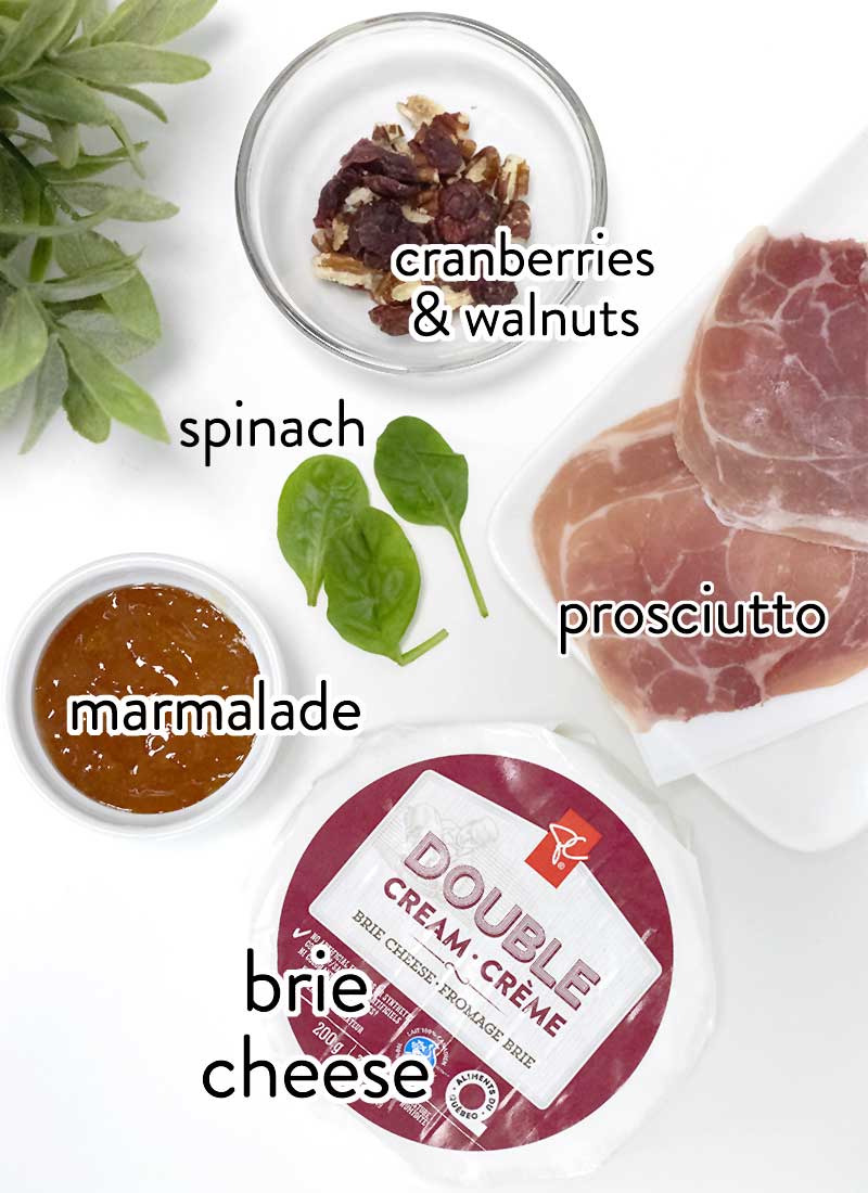 ingredients for brie cake on a white background