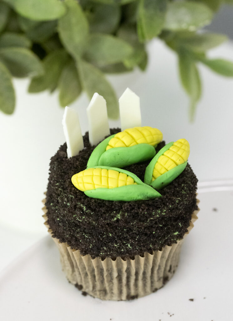 chocolate cupcake decorated with chocolate corn