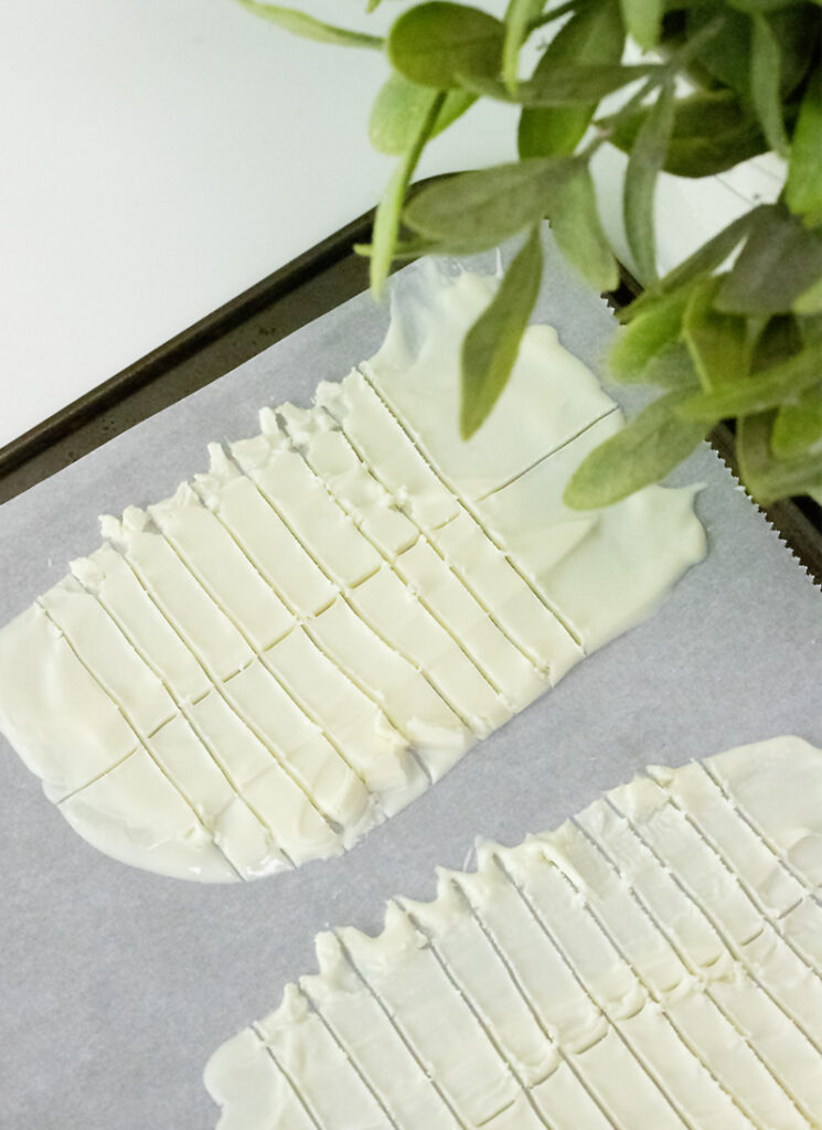 white candy melts on a baking sheet