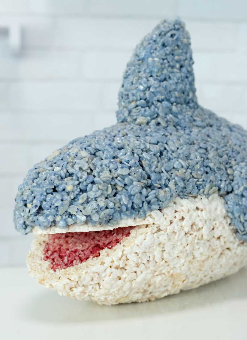 a shark rice krispie treat with a red mouth