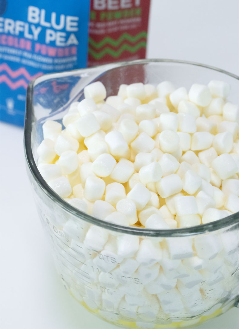 mini marshmallows coated in butter in a large, glass bowl