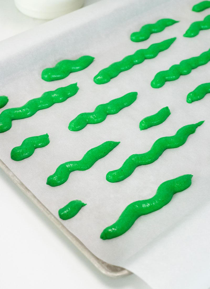 pipe watermelon stripes onto baking sheet