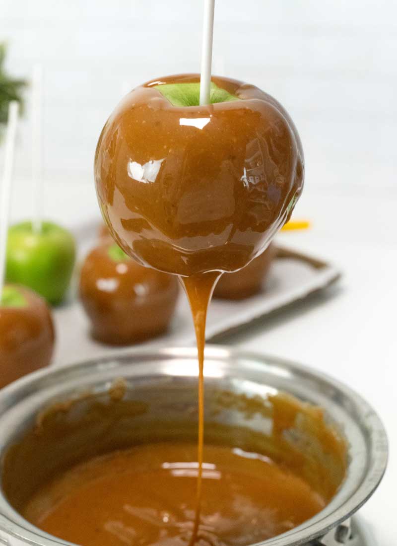 coat apples in melted caramel