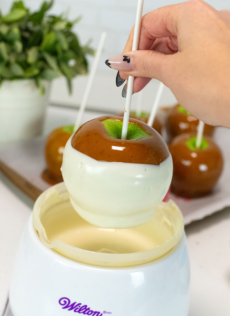 dunk candy apples in chocolate