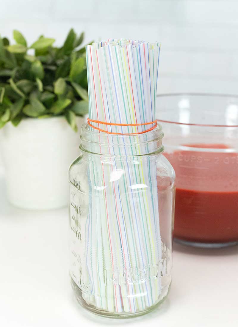 place straws in a mason jar