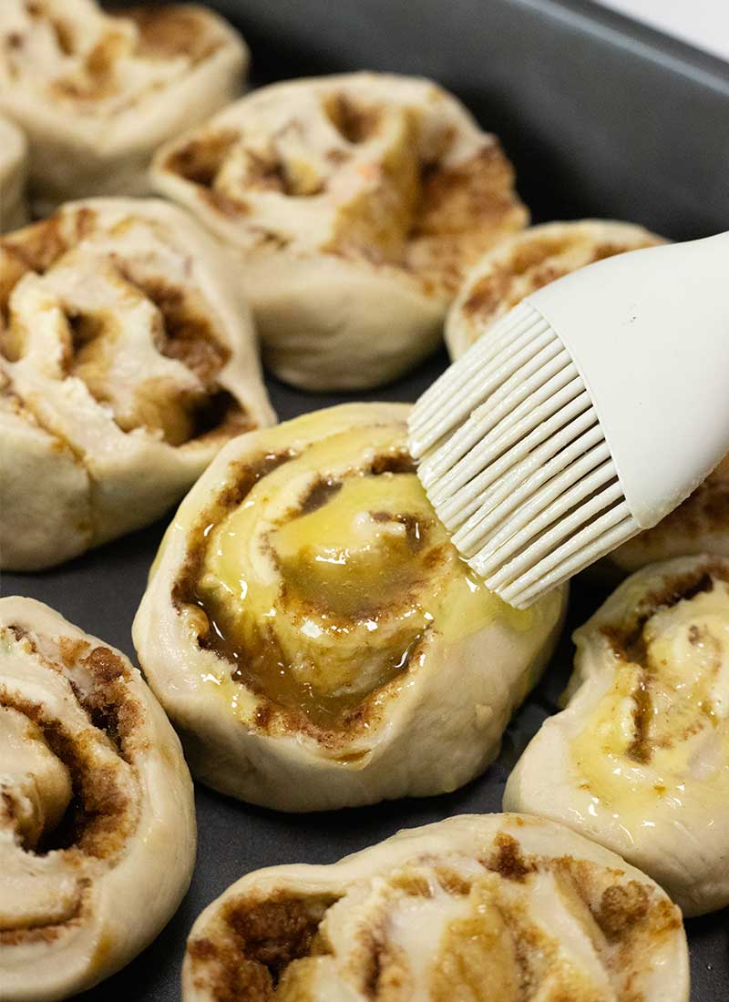 brush buns with butter and sugar