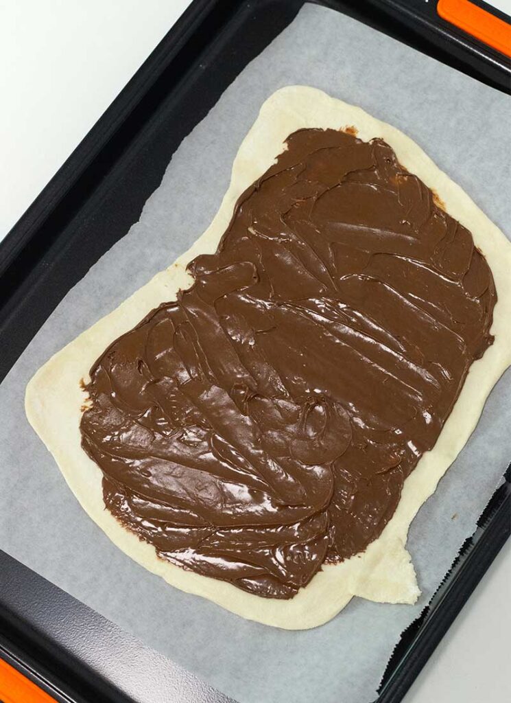 spread nutella onto puff pastry