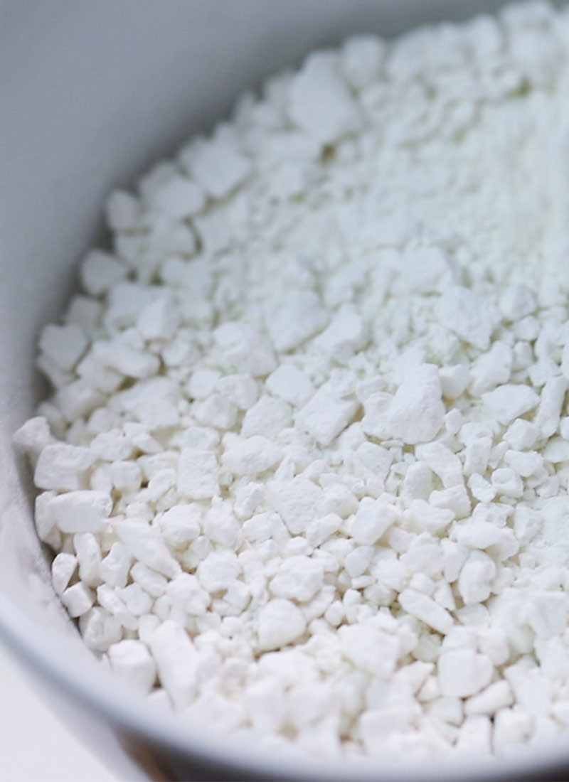A close up of a white bowl containing shira tama ko, which is a type of rice flour.